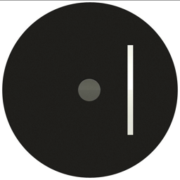 a dark grey circle with a small grey dot at its centre and a vertical white line to the right of it